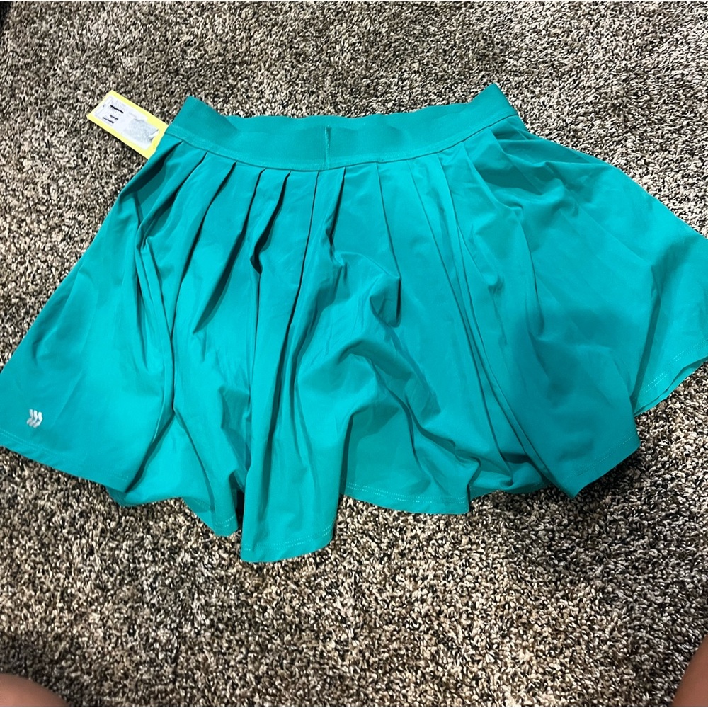 Green mini skirt!